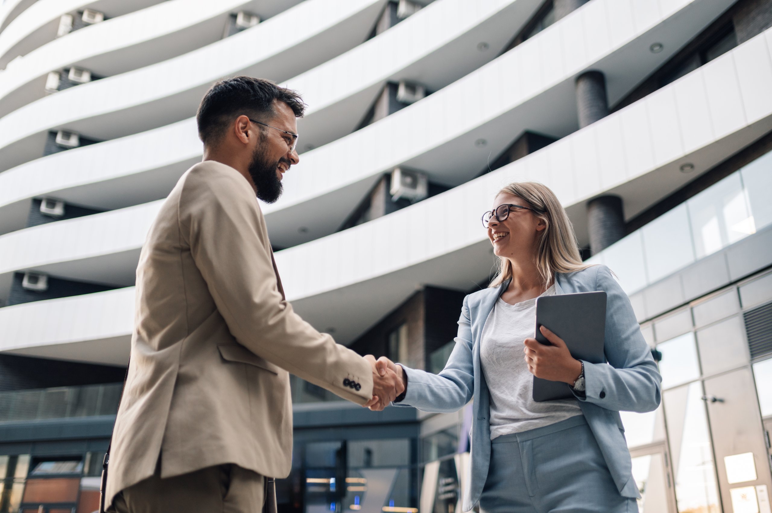 Business partnership handshake