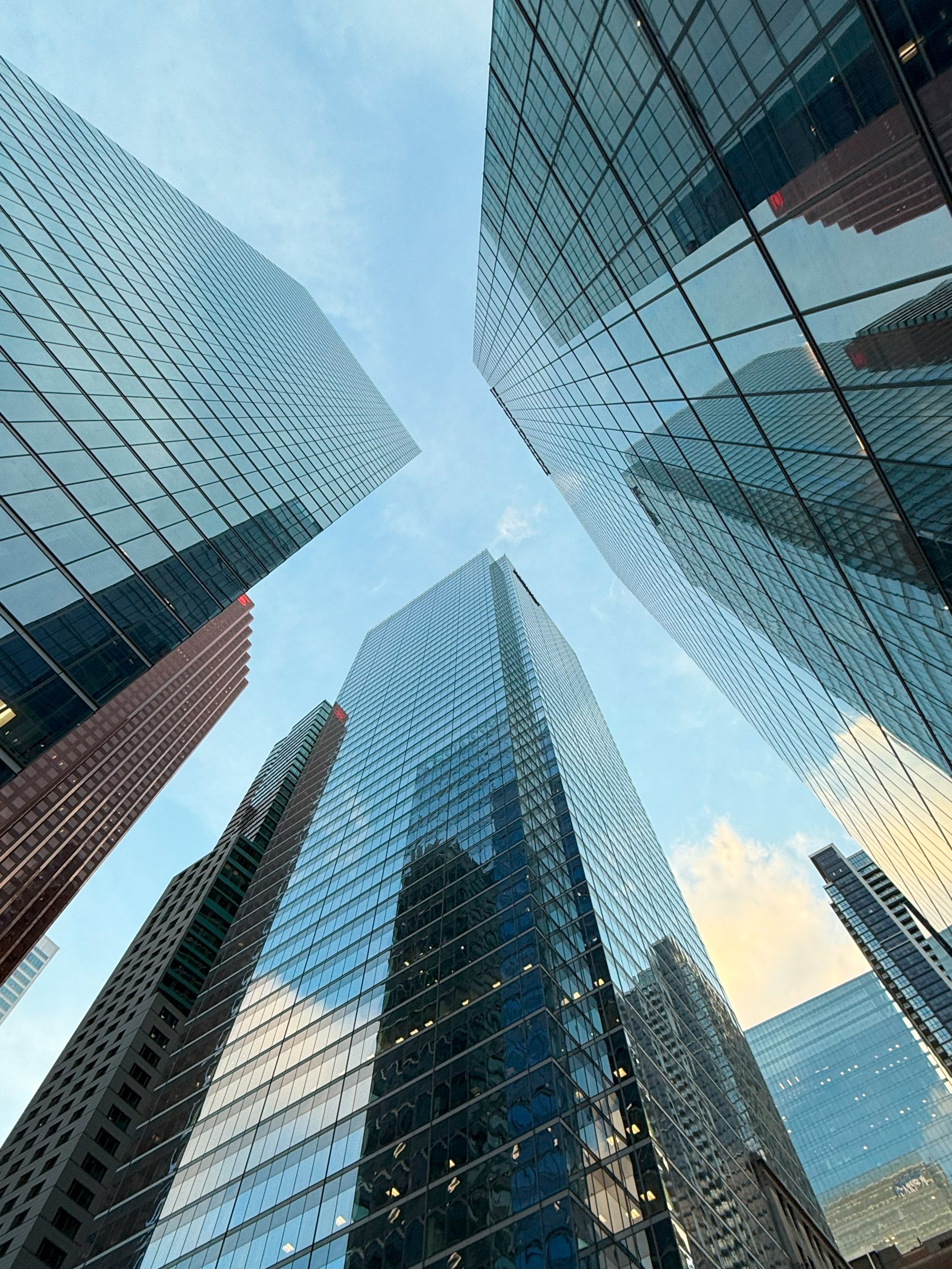 Modern glass skyscrapers representing commercial properties