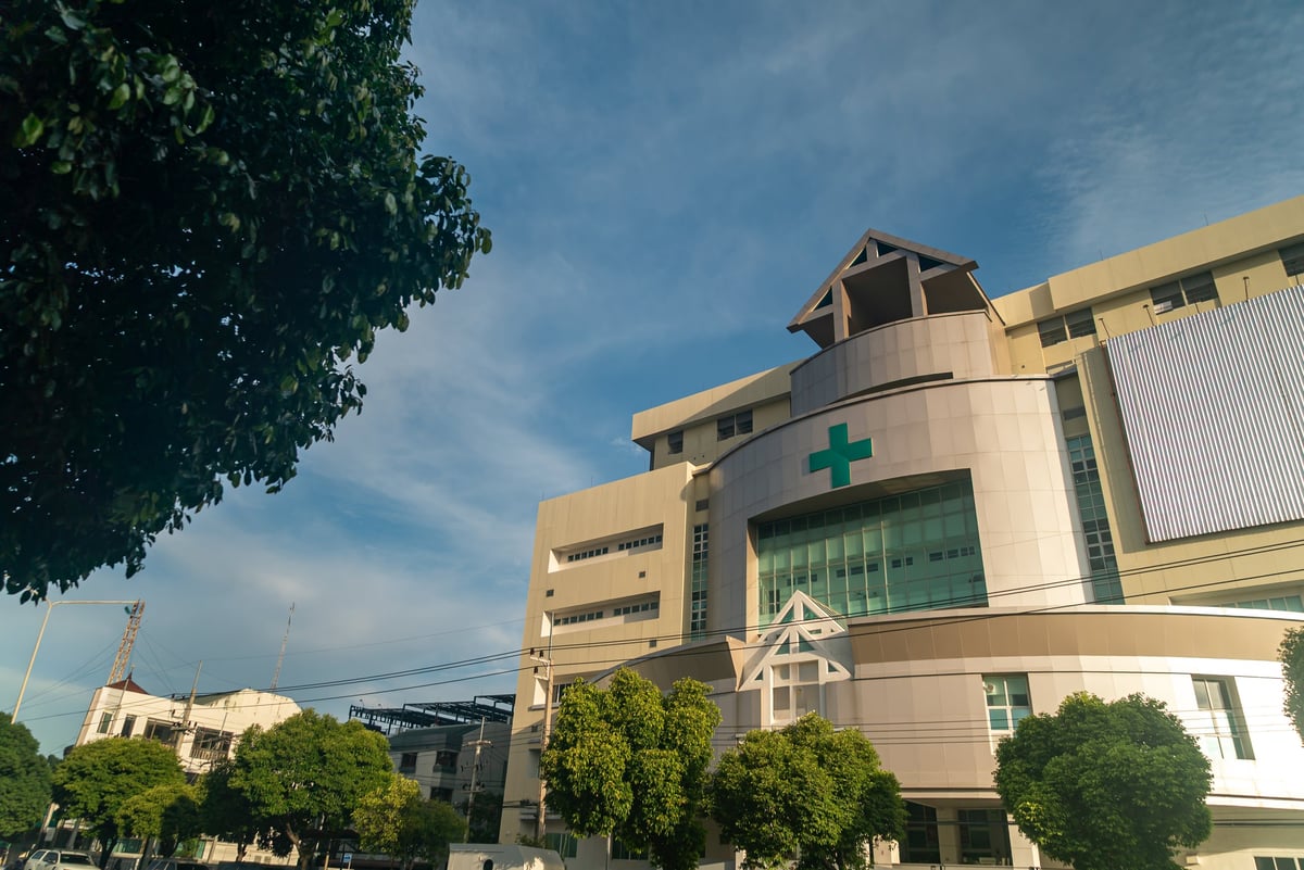 Modern pharmacy building representing healthcare facilities